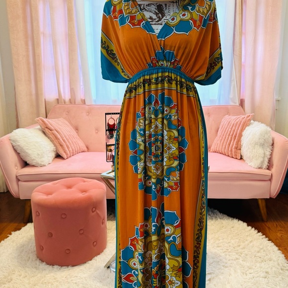 Dresses & Skirts - Beautiful & vibrantly colored maxi dress. Fit a size 12 thru 16. One of a kind!
